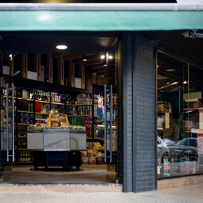 exterior of commercial retail store with glass windows and doors