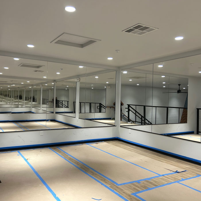 commercial gym / studio with large mirrored walls from Blossom Hill Glass in San Jose, CA